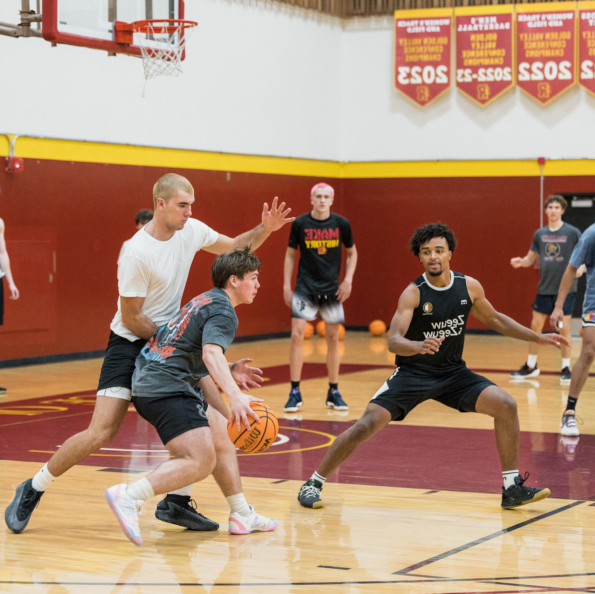 Students playing basketball